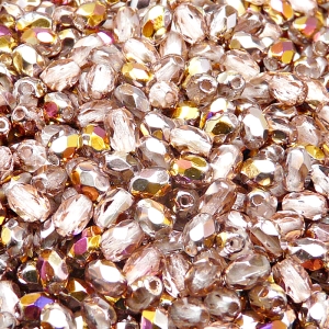 50ks České skleněné broušené tvarové ohňovky olivy 6x4mm čirá/ gold capri polopokov